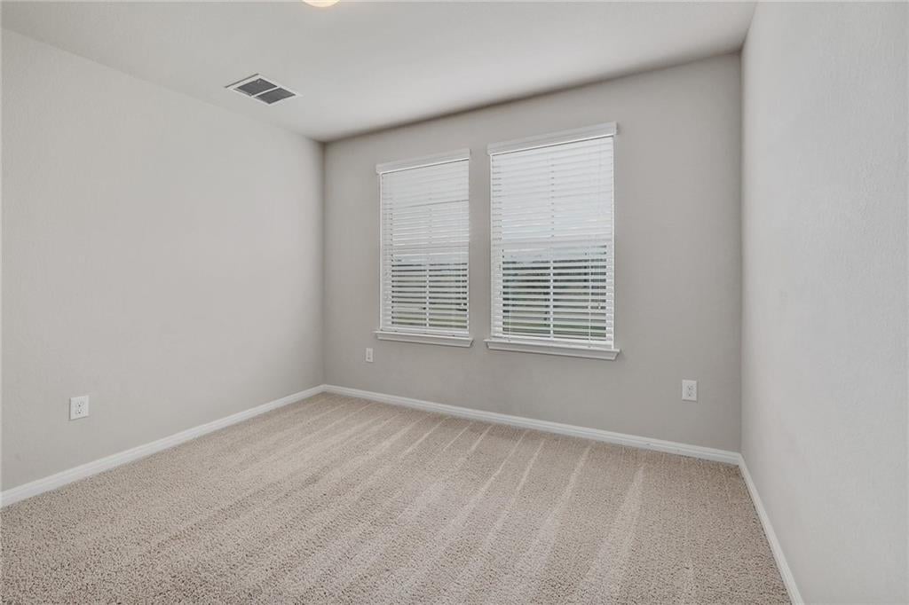 Modern Corner Lot Townhome in Coveted Carrington Court!
