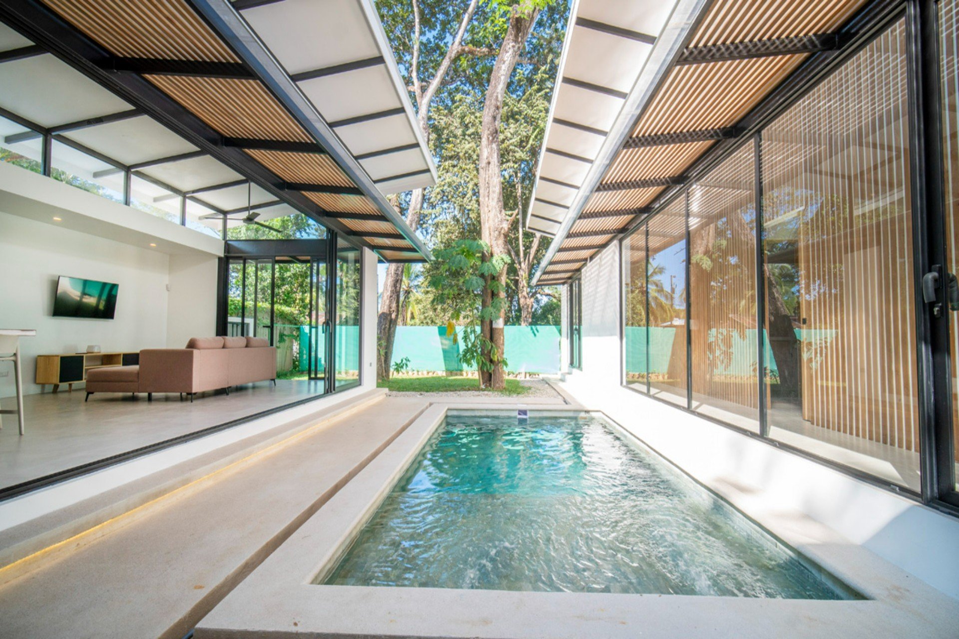 Casa Cenizaro | Elegant 4-Bed Tropical Retreat with Pool in Surfside, Potrero