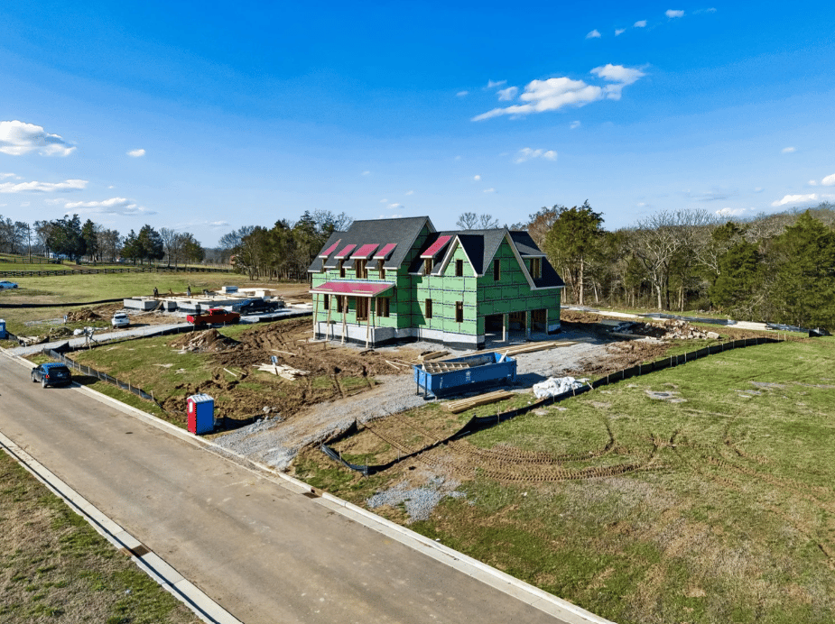 Luxury new construction homes in an upscale Tennessee neighborhood featuring modern architecture, high-end finishes, manicured landscaping, and elegant residential streets.