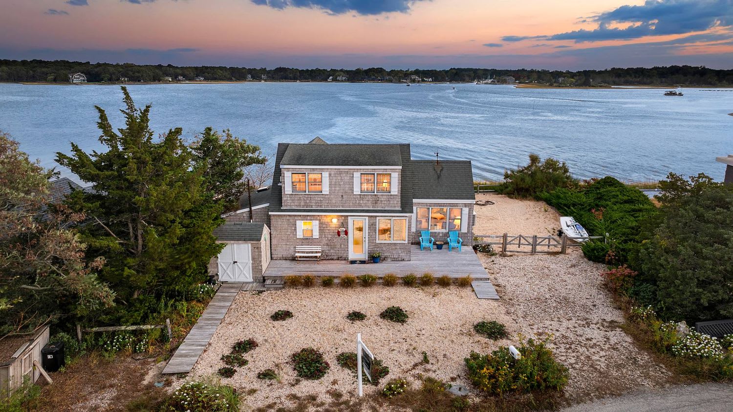 Panoramic Waterfront Vistas in a Coveted Harborside Neighborhood