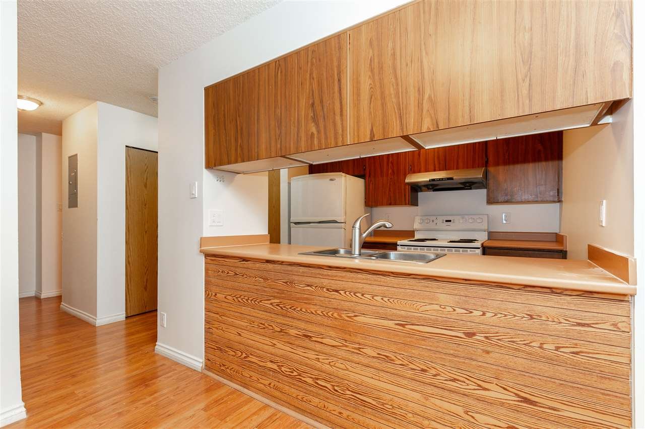 303-9521 Cardston Ct