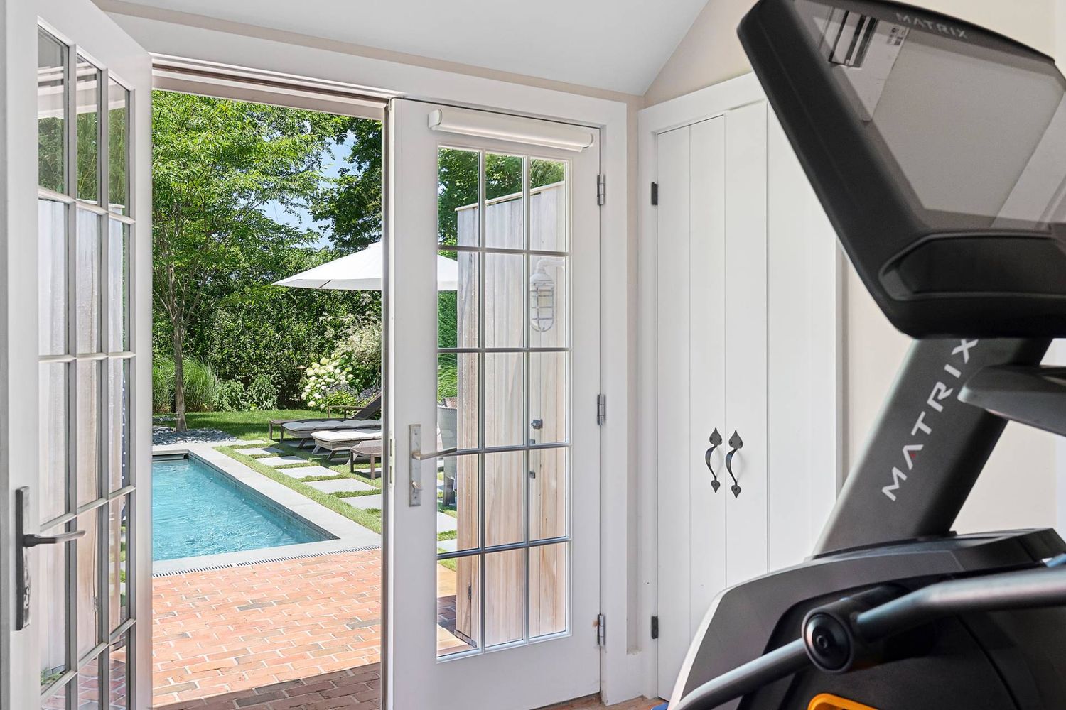 Modernized Vintage Cottage with Knockout Backyard, Moments to Village Main