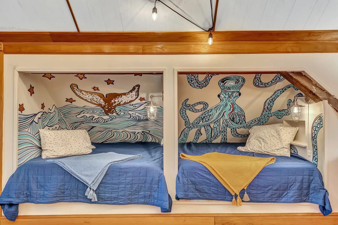 Whimsical Hand-Painted Murals in this Historic Diamond Cove Home