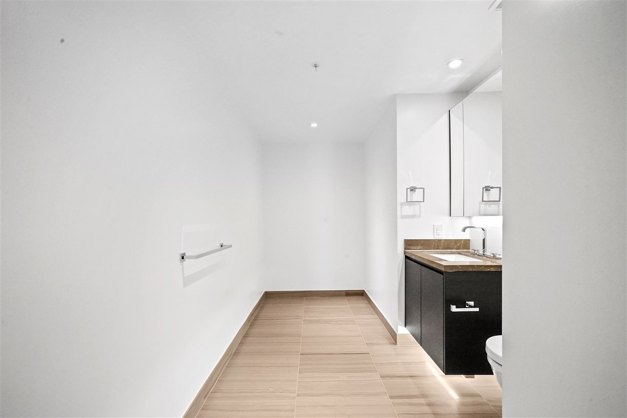 203-7128 Adera St