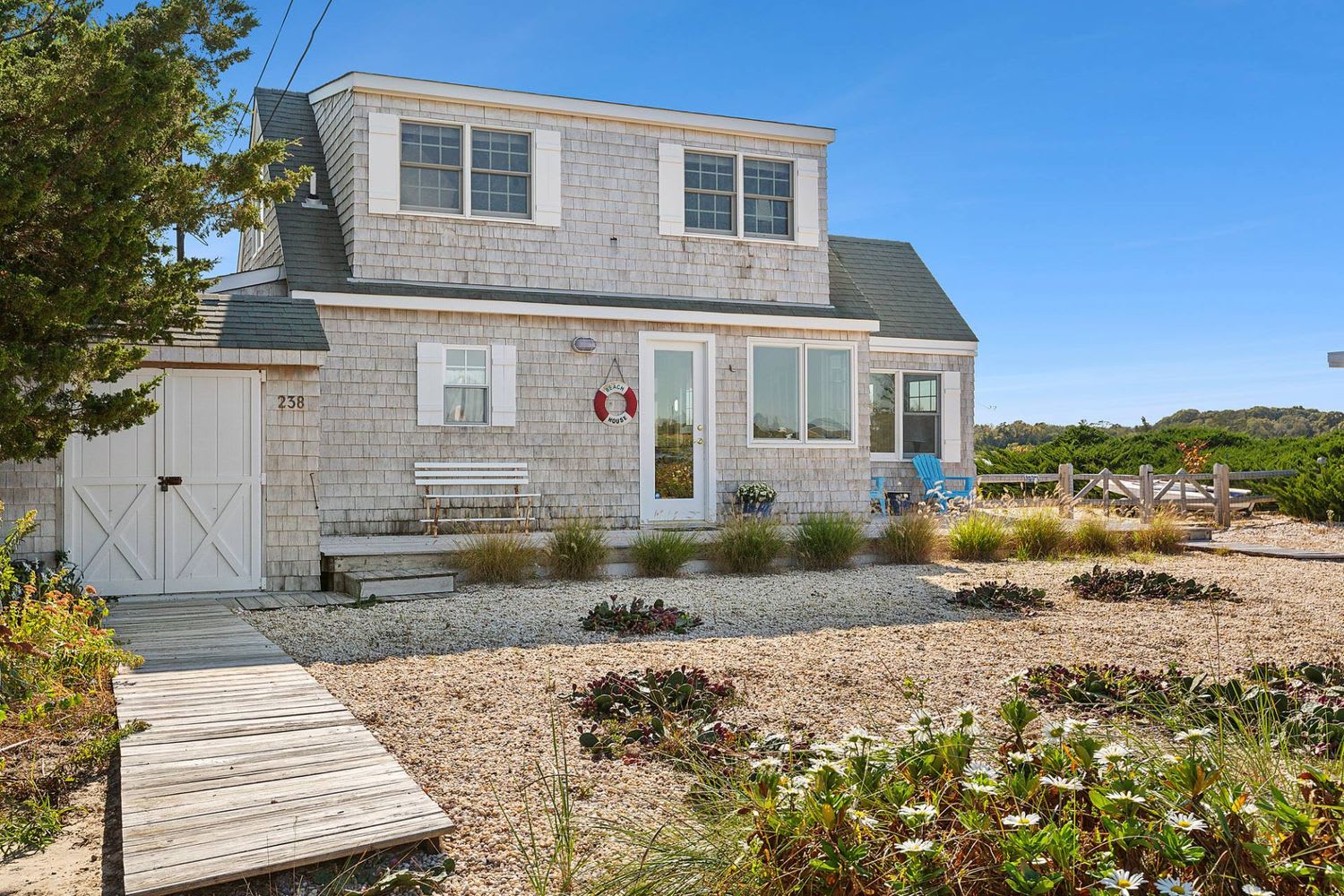 Panoramic Waterfront Vistas in a Coveted Harborside Neighborhood