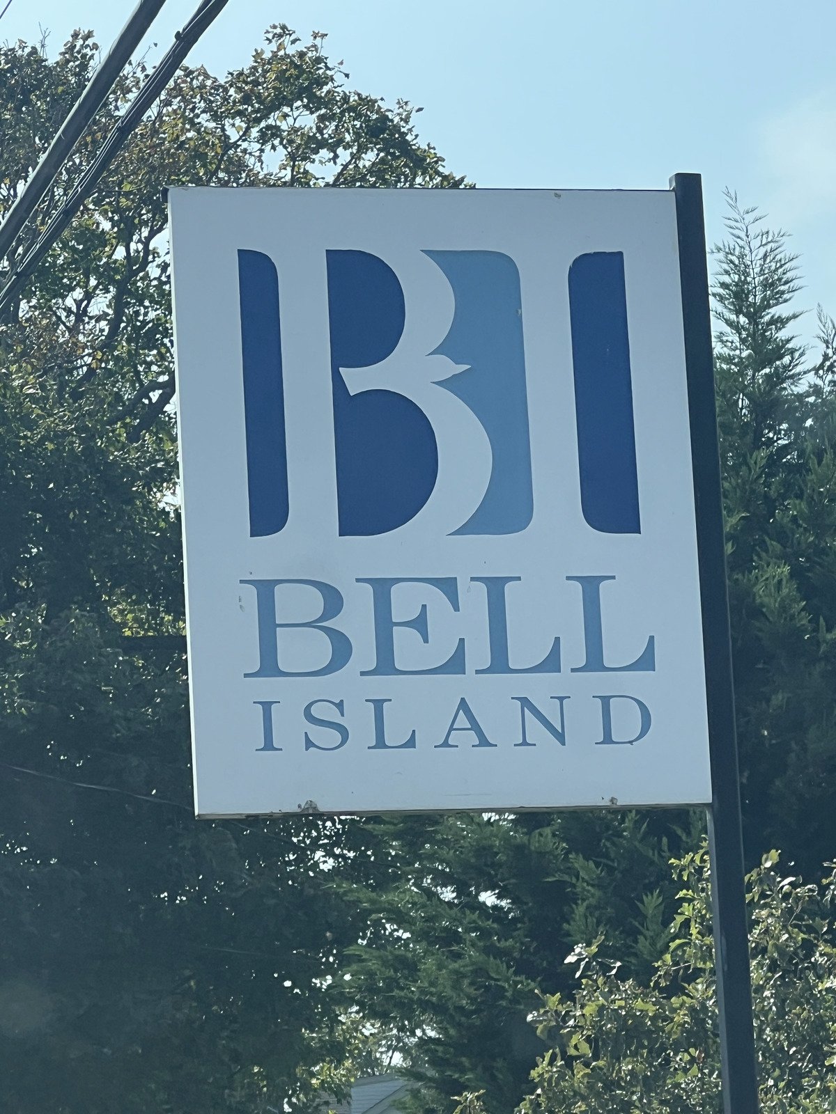 Scenic waterfront views of Bell Island, Norwalk, Connecticut showcasing luxury homes along Long Island Sound.