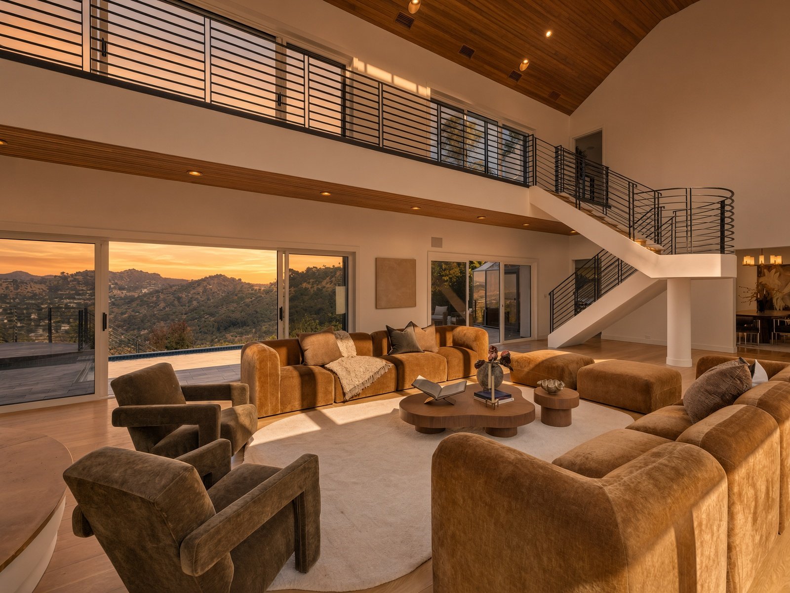 Two-story living room with hillside views at 11955 Pinnacle Pl, The Summit, Beverly Hills
