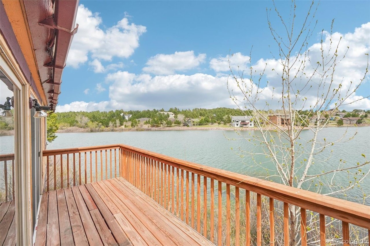 Lake Woodmoor Investor Special – Rare 1-Bed Lakeside Townhome with Huge Upside