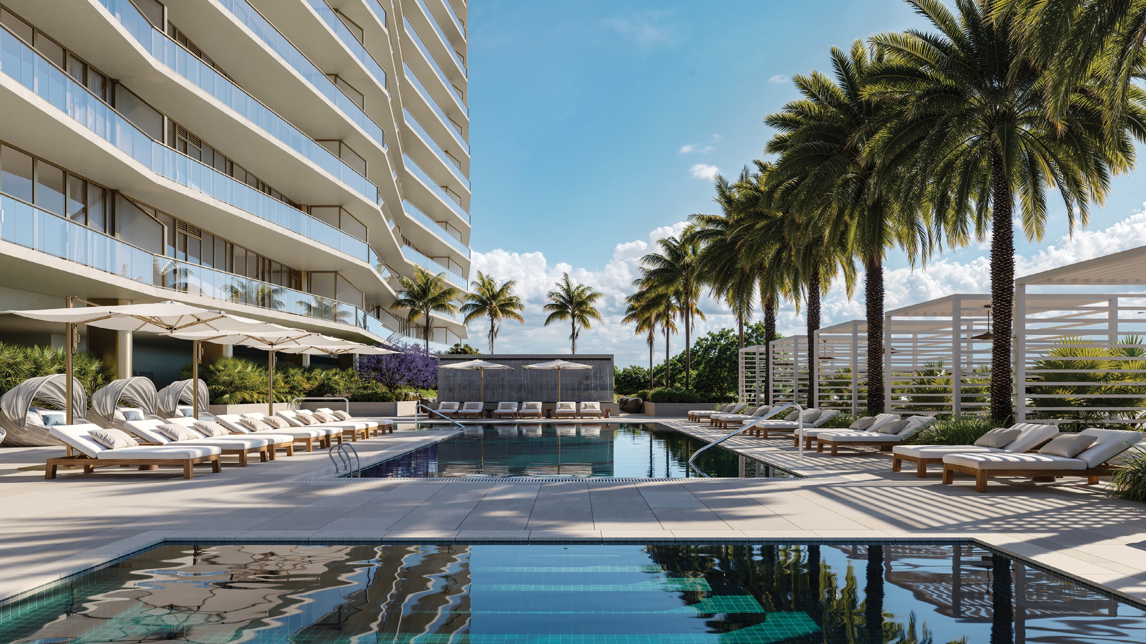 Rendering of The Berkeley's pool deck with loungers, cabanas, palm trees and residence balconies above