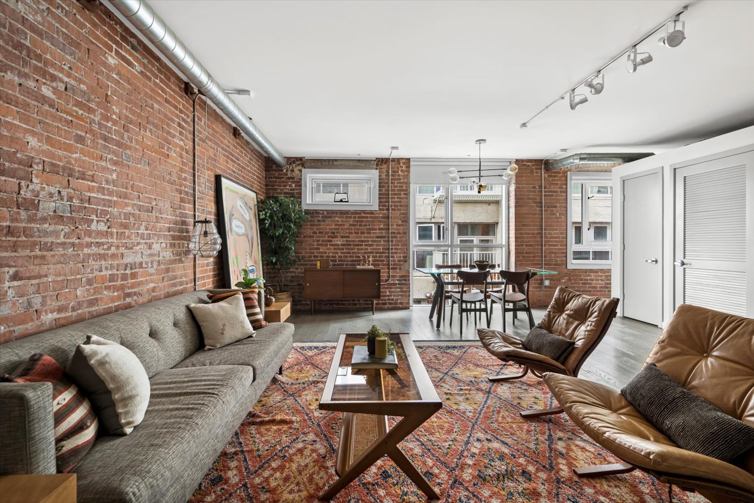 Breathtaking Exposed Brick & Beam Loft at THE BARKER BLOCK