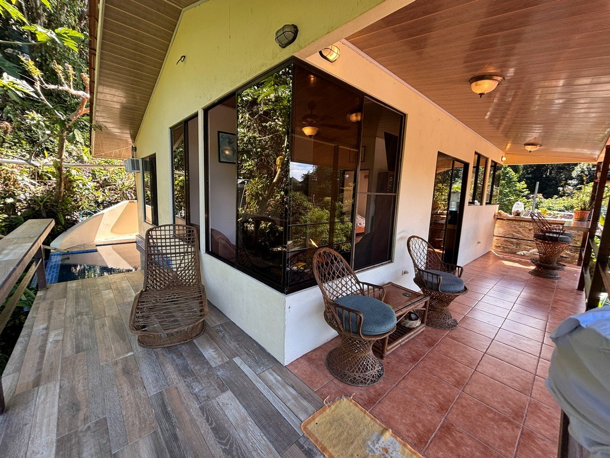 0.16 Acres – 4 Living Units, 7 Bedroom Riverfront Investment Package Near Dominical Beach With Owner Financing!!!