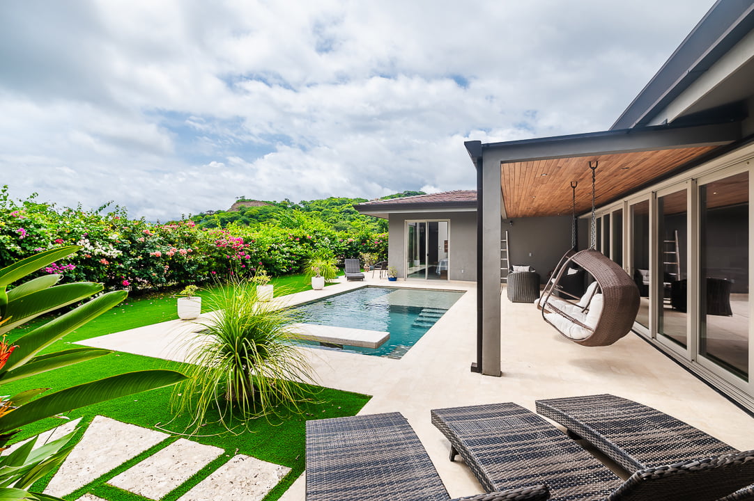 Casa Coralina | Elegant Home in Top Gated Community with Private Pool, Lush Gardens, & Incredible Amenities.  Located on a Double Lot w/ Ocean View!