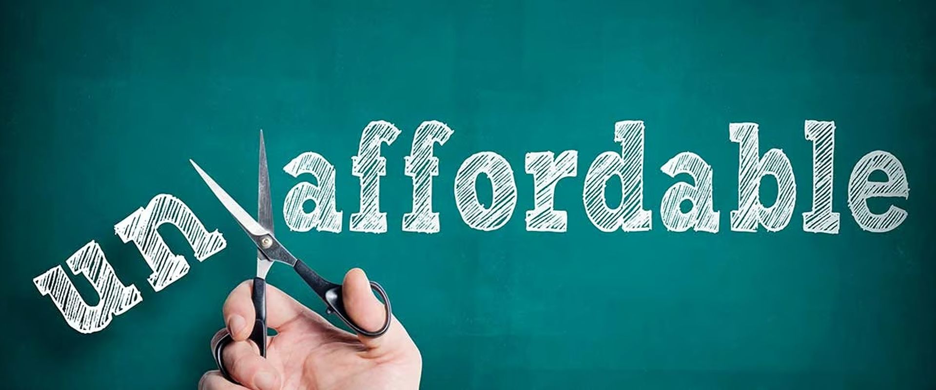 Unaffordable written on a teal chalkboard as scissors cut through the lettering.