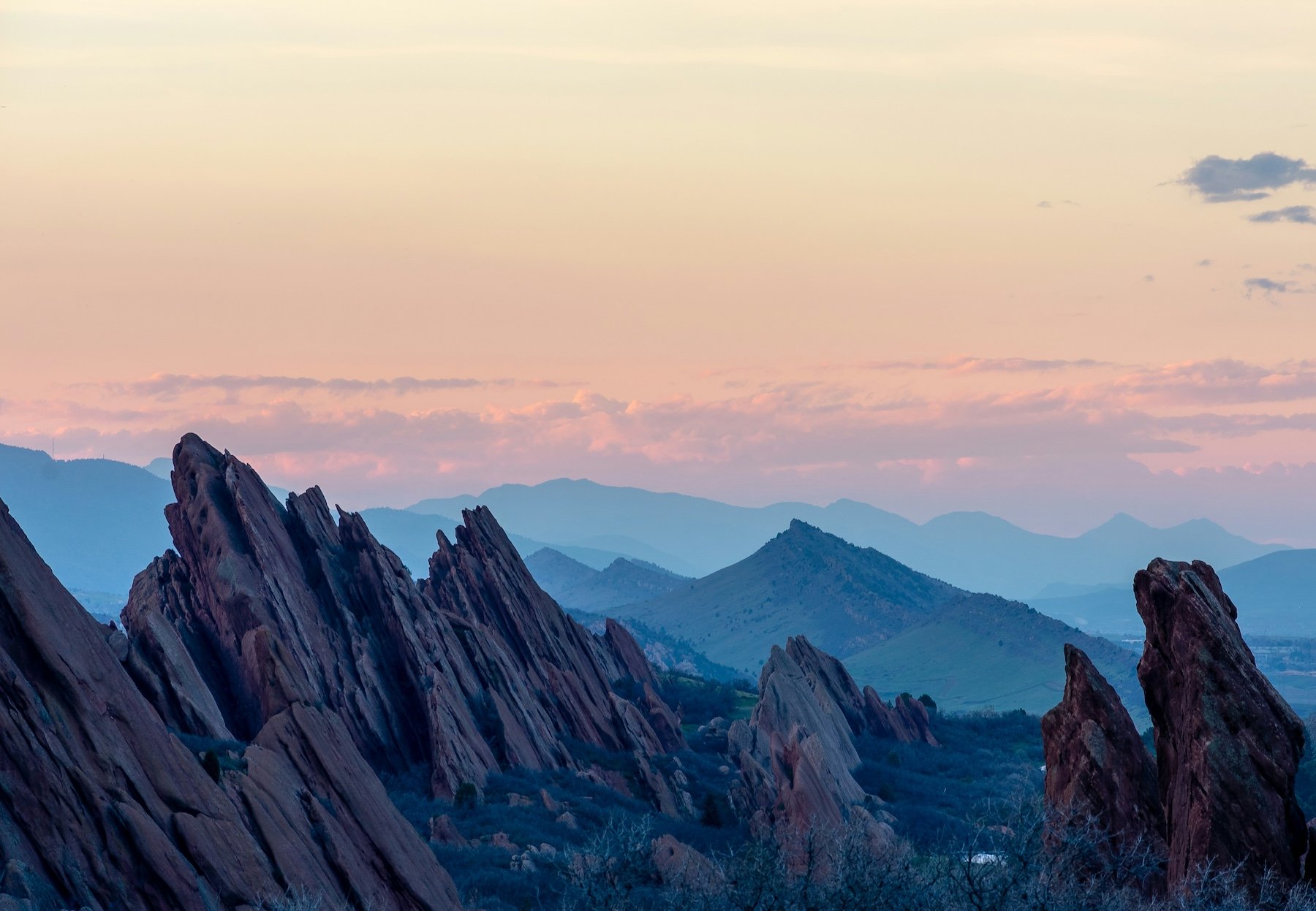 Roxborough State Park red rock formations lit by warm evening sunlight