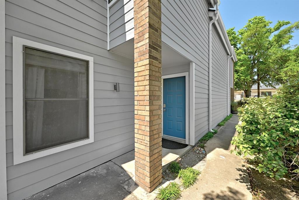 Charming Two-Story Condo in Gated Summerwind w/ Fireplace & Balcony