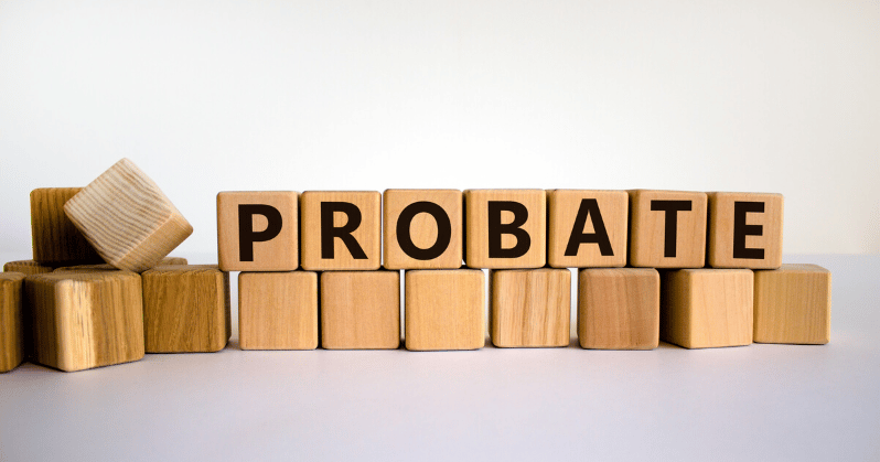 Wooden blocks spell “PROBATE” above a row of plain blocks.