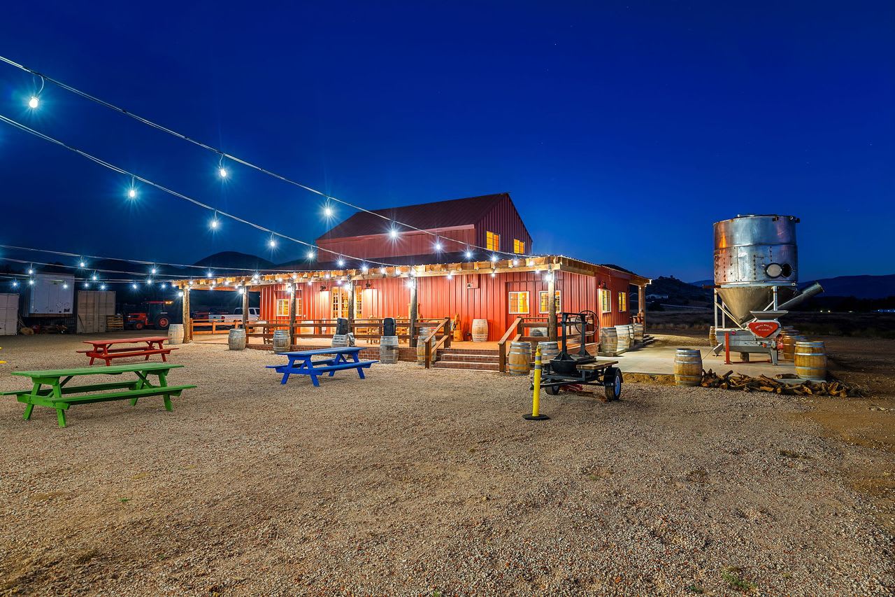 Spacious barn event area on a Los Angeles winery property, great for various events.