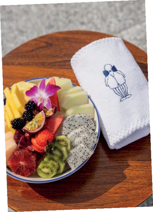 Fresh fruit and a monogrammed Mr. C towel, part of the residence service program