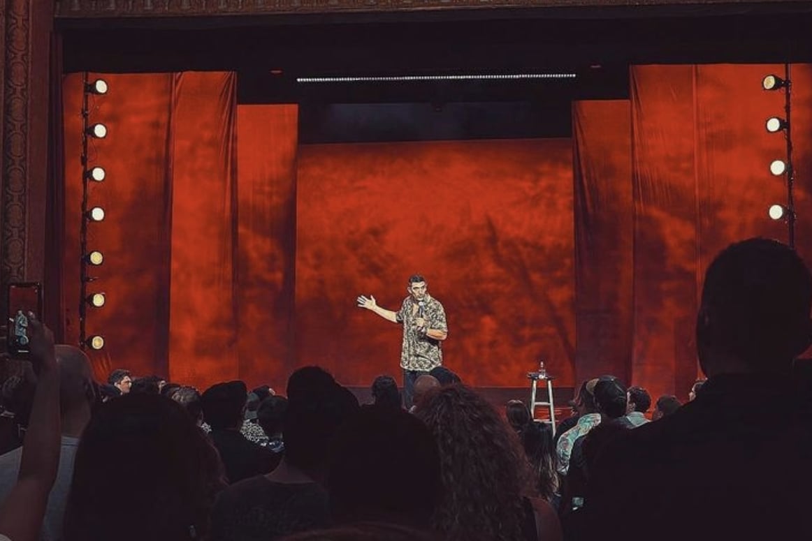 People toasting with wine glasses
