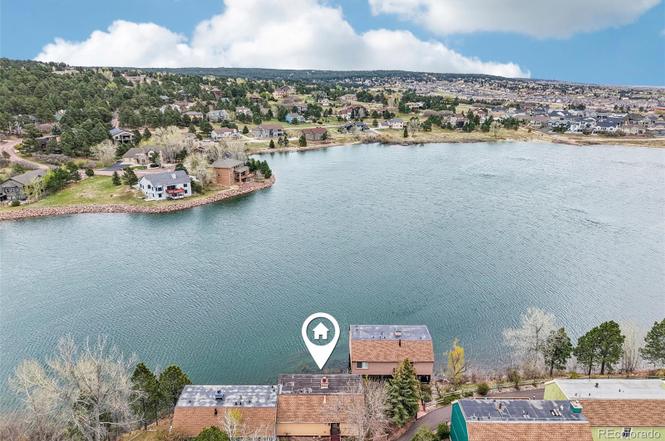 Lake Woodmoor Investor Special – Rare 1-Bed Lakeside Townhome with Huge Upside