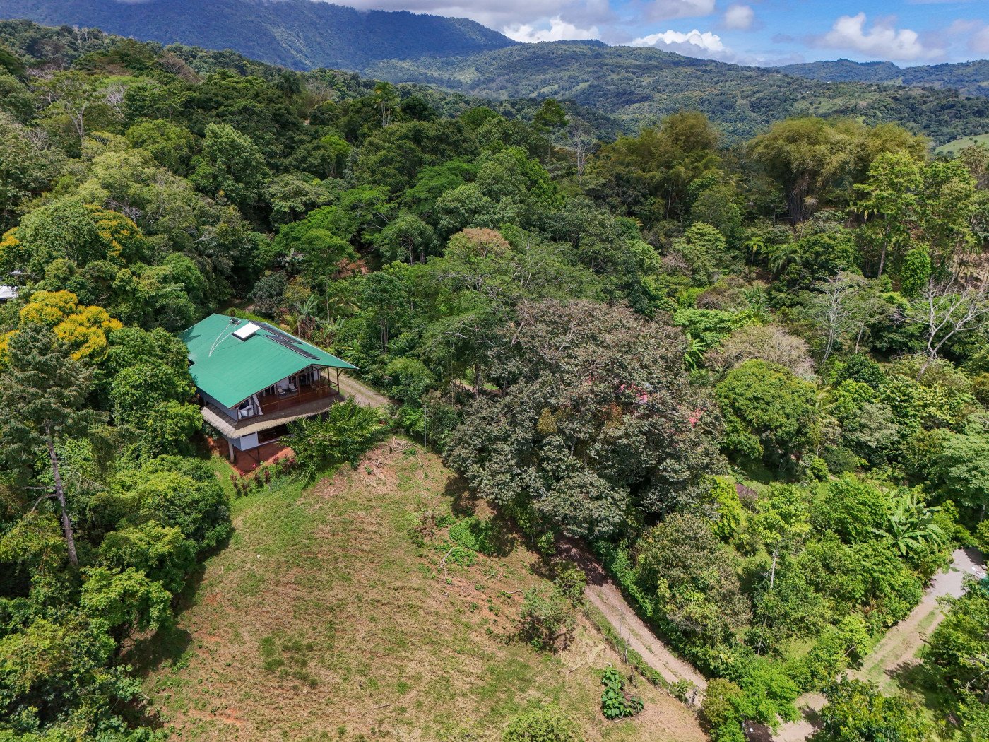 TROPICAL RETREAT IN PLATANILLO – OCEAN VIEW HOME PLUS APARTMENT IN ESTABLISHED COMMUNITY – 0.88 ACRES