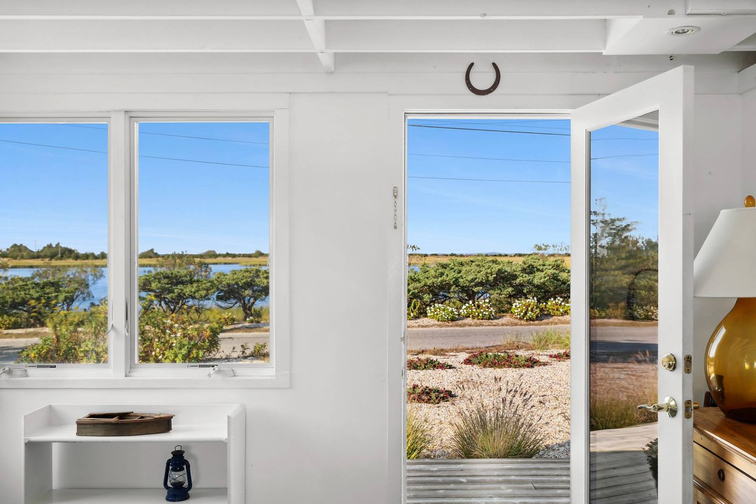 Panoramic Waterfront Vistas in a Coveted Harborside Neighborhood