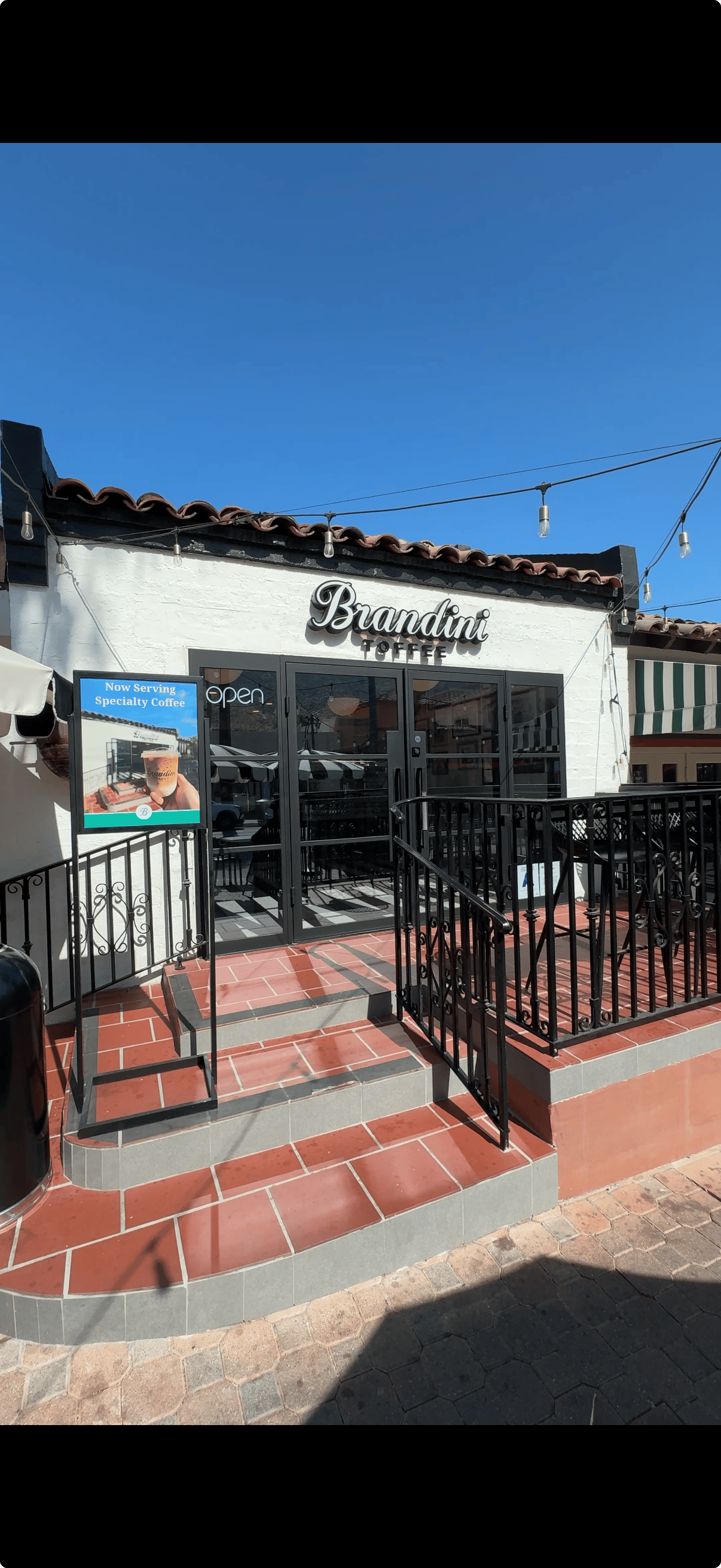 Exterior entrance of Brandini Toffee on South Palm Canyon Drive in downtown Palm Springs
