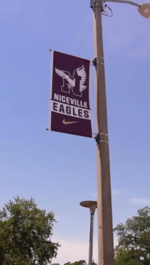 Niceville Eagles banner with an eagle emblem hanging from a streetlight pole.