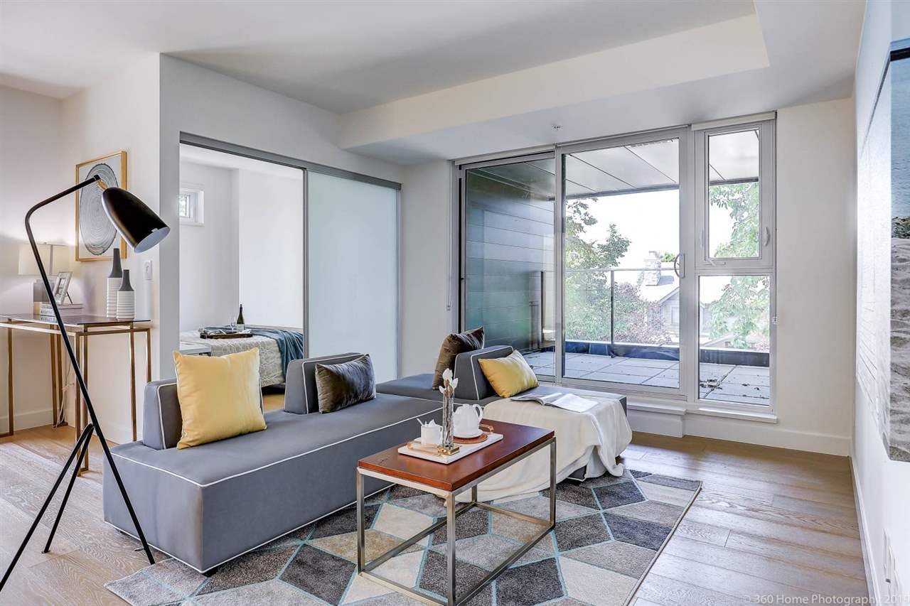 309-1571 W 57th Ave