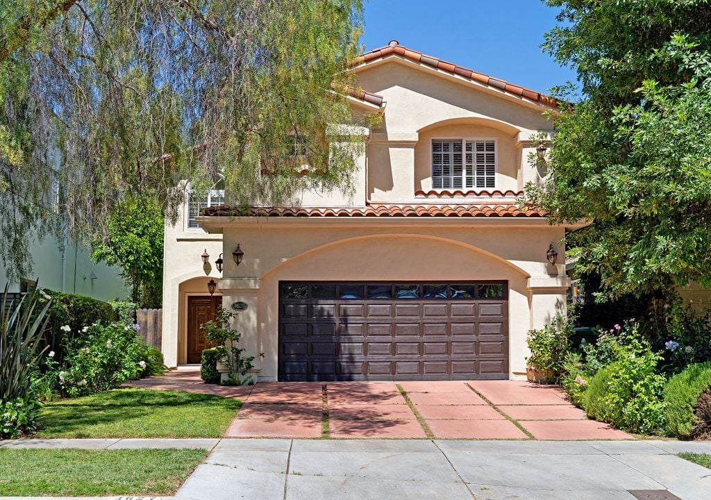 Newer custom built home on a quiet tree lined street