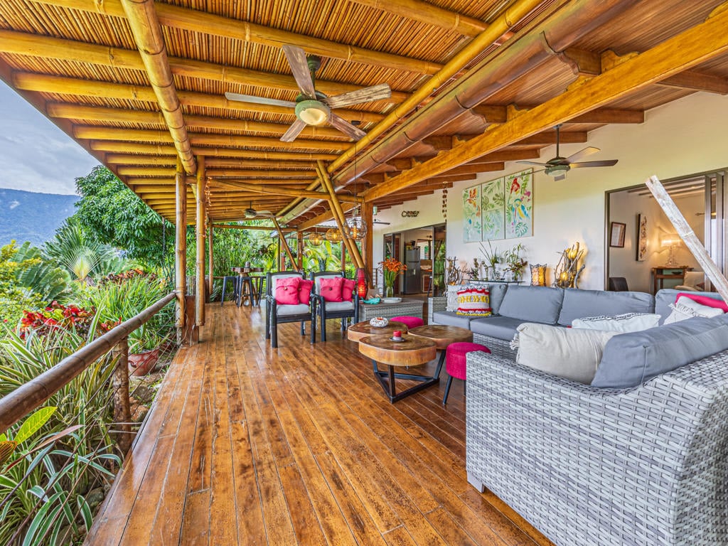Villa Tres Vistas, a stunning luxury home located on the desirable Calle Perezoso in Ojochal