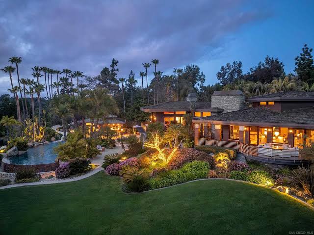 Luxury equestrian estate in Rancho Santa Fe featuring expansive grounds, mature landscaping, horse facilities, and the timeless elegance that defines one of Southern California's premier luxury communities.