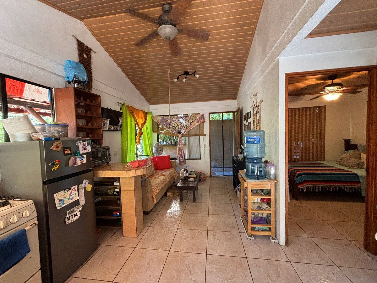 0.16 Acres – 4 Living Units, 7 Bedroom Riverfront Investment Package Near Dominical Beach With Owner Financing!!!