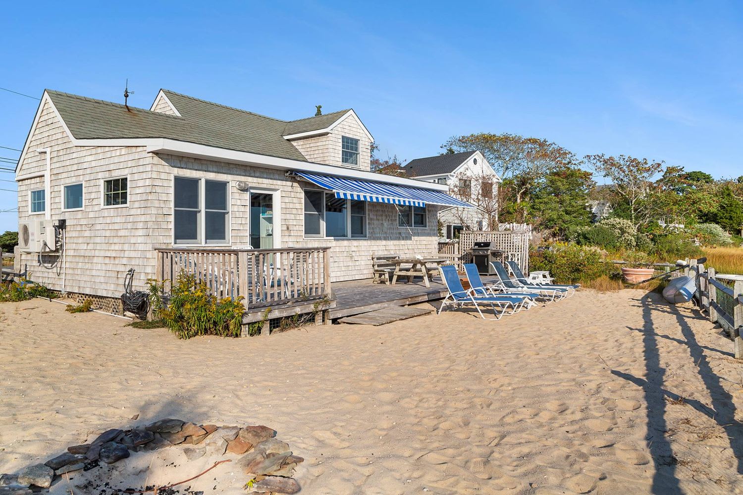 Panoramic Waterfront Vistas in a Coveted Harborside Neighborhood