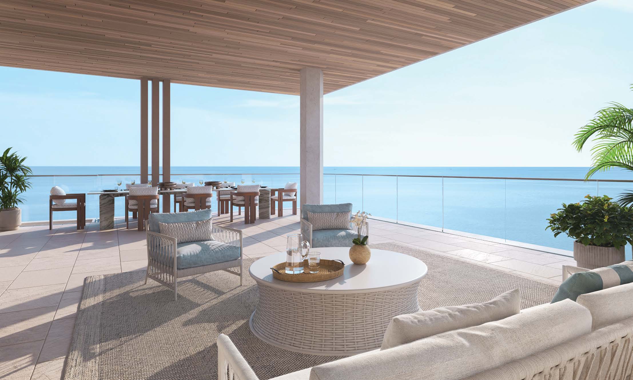 Rendering of a covered terrace with lounge seating facing the Gulf at Olana Naples Residences