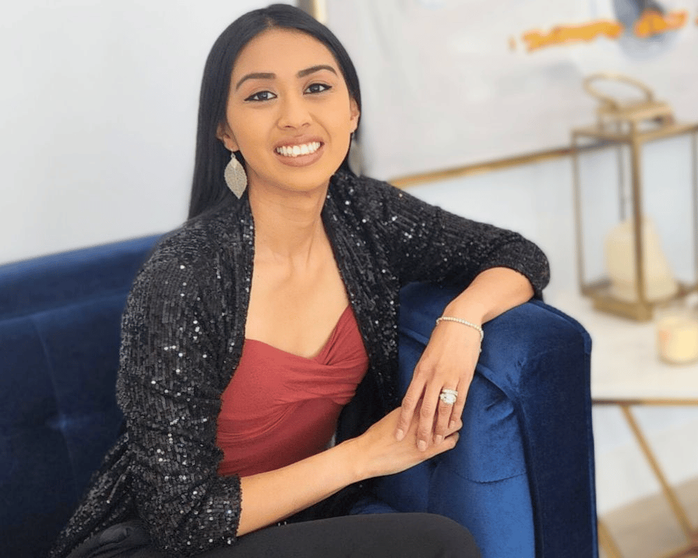 Expert real estate agent Kristin Oganisyan seated in a modern luxury interior, your dedicated partner for Granite Bay luxury homes and Placer County real estate