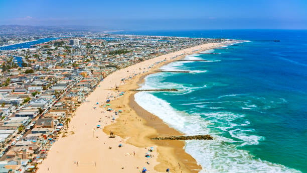 Aerial view of Balboa Peninsula and Newport Beach coastline with overlay showing short-term rental permit zones for 2026
