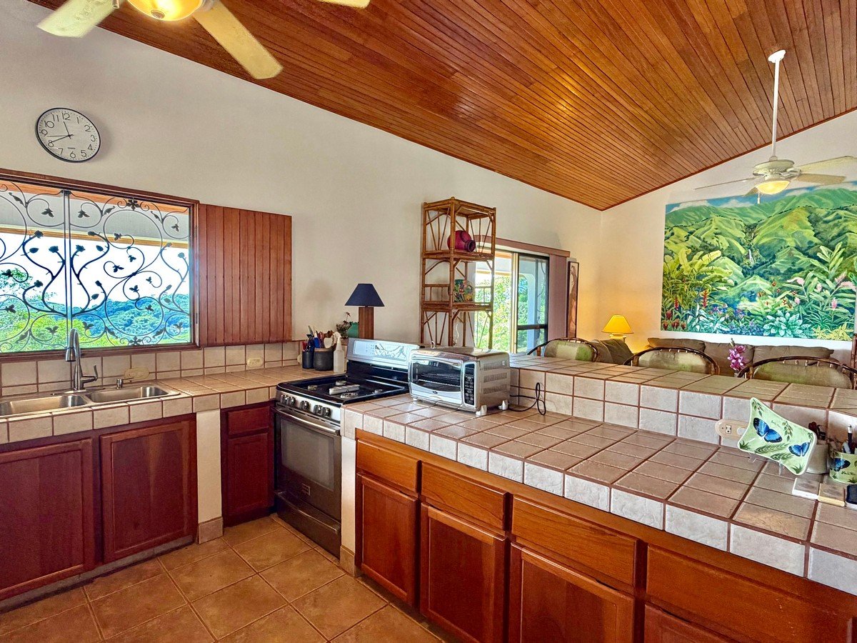 3.64 ACRES – 3 Bedroom Home With Expansive Ocean Views, Multiple Areas to Build, Public Road With Commercial Potential, 10min to the Beach!!