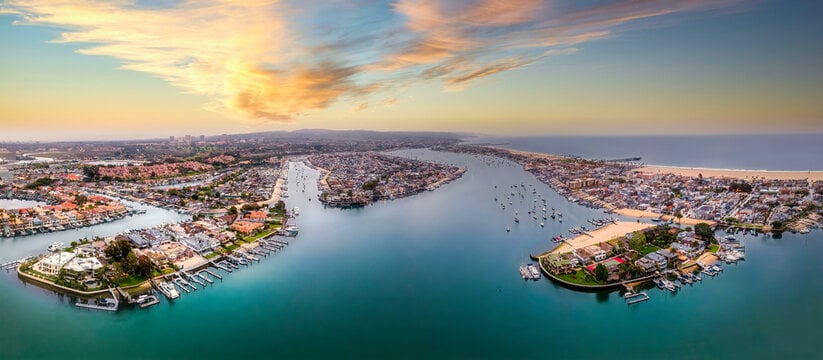 Aerial view of luxury Newport Beach homes for sale along the Pacific coastline in 2026, representing the Newport Beach real estate market