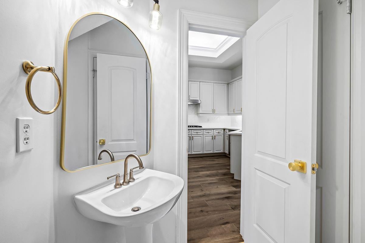 Powder bath with brass fixtures, Barton Hollow, Westlake, Austin.