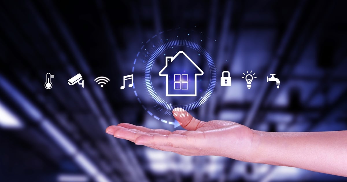 A close-up of an open hand with a virtual series of icons above it for home, security, illumination, water, wi-fi, and more.