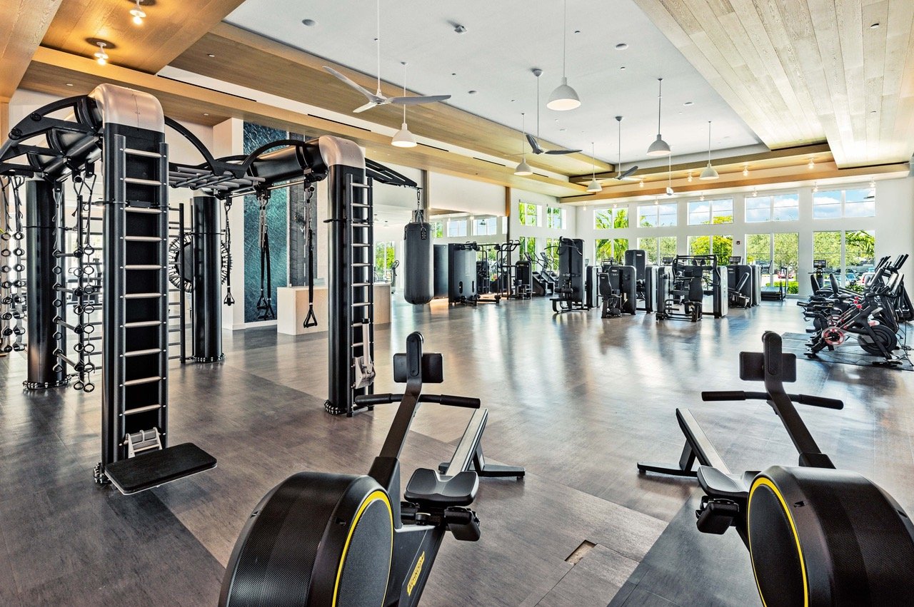 Fitness center with floor-to-ceiling windows at Kalea Bay
