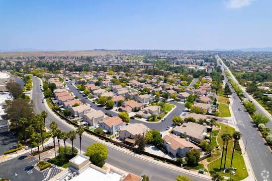 Aerial view of Mission Grove homes and tree-lined streets in Riverside.