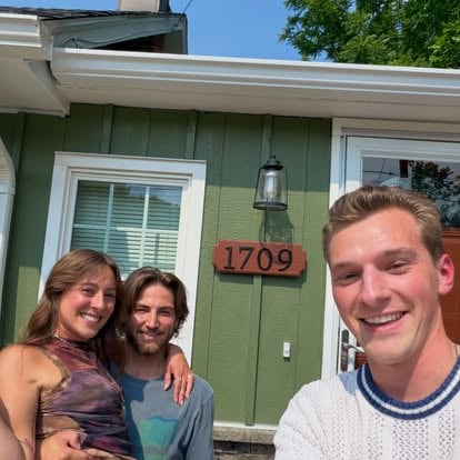 Aaron with Ryan and Josie outside their first home