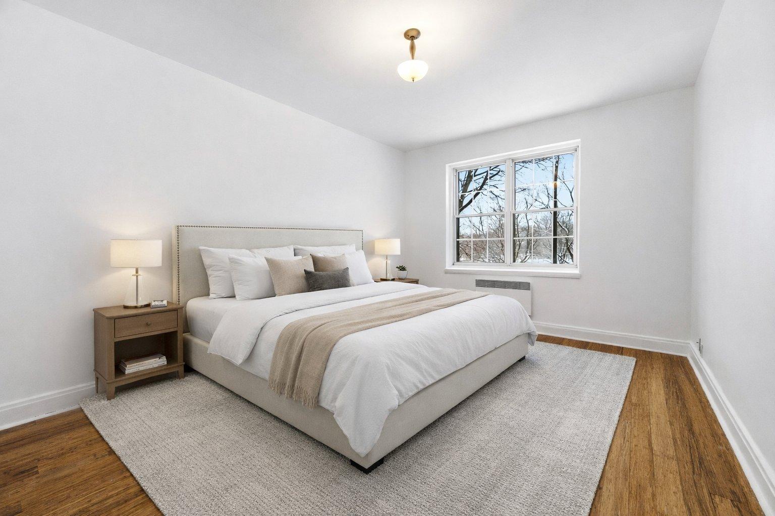At the edge of Westmount | Corner unit with a view of Mount Royal