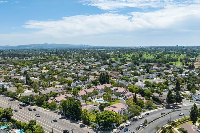 Costa Mesa homes for sale in the fall season with colorful trees and coastal light