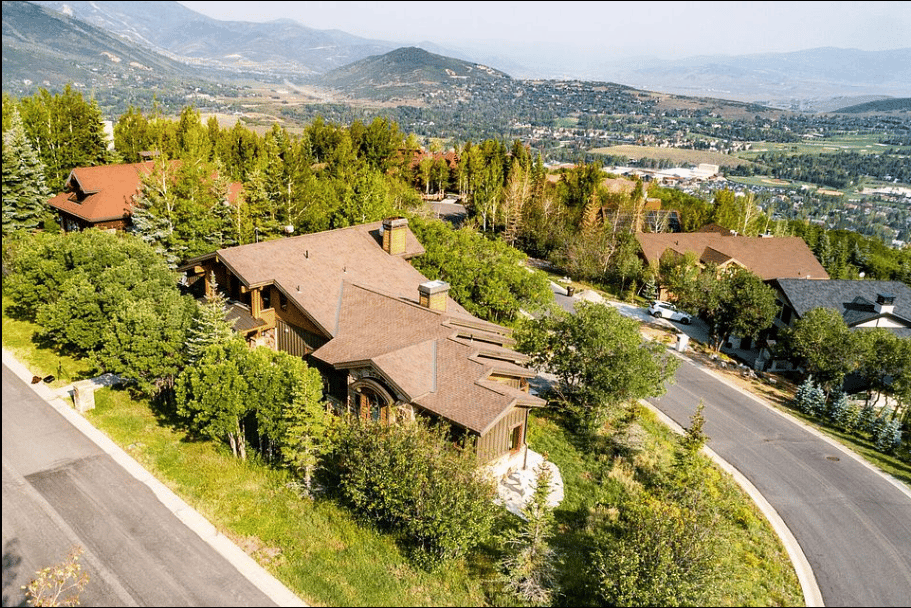 Aerial view of Aerie homes among trees, with mountain and valley views.