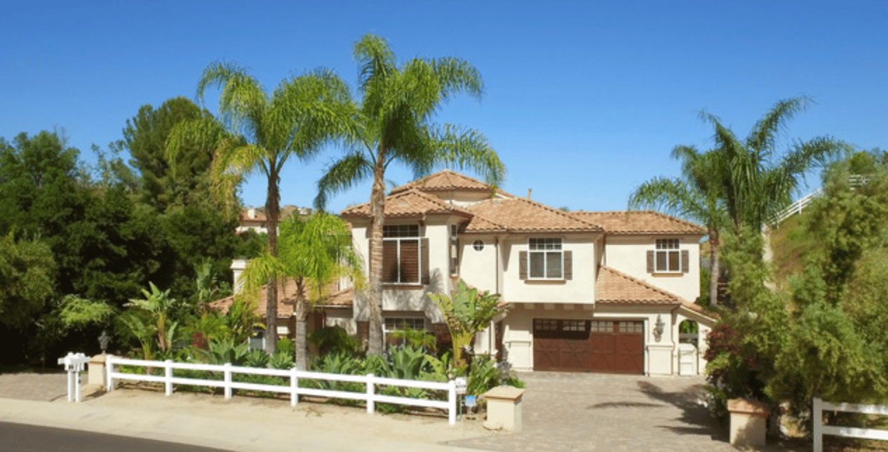 surrounded by hibiscus, roses, purple myrtle