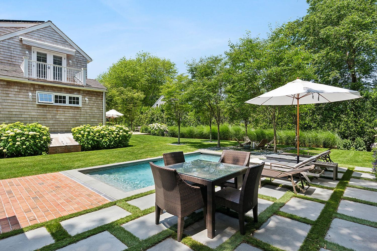Modernized Vintage Cottage with Knockout Backyard, Moments to Village Main