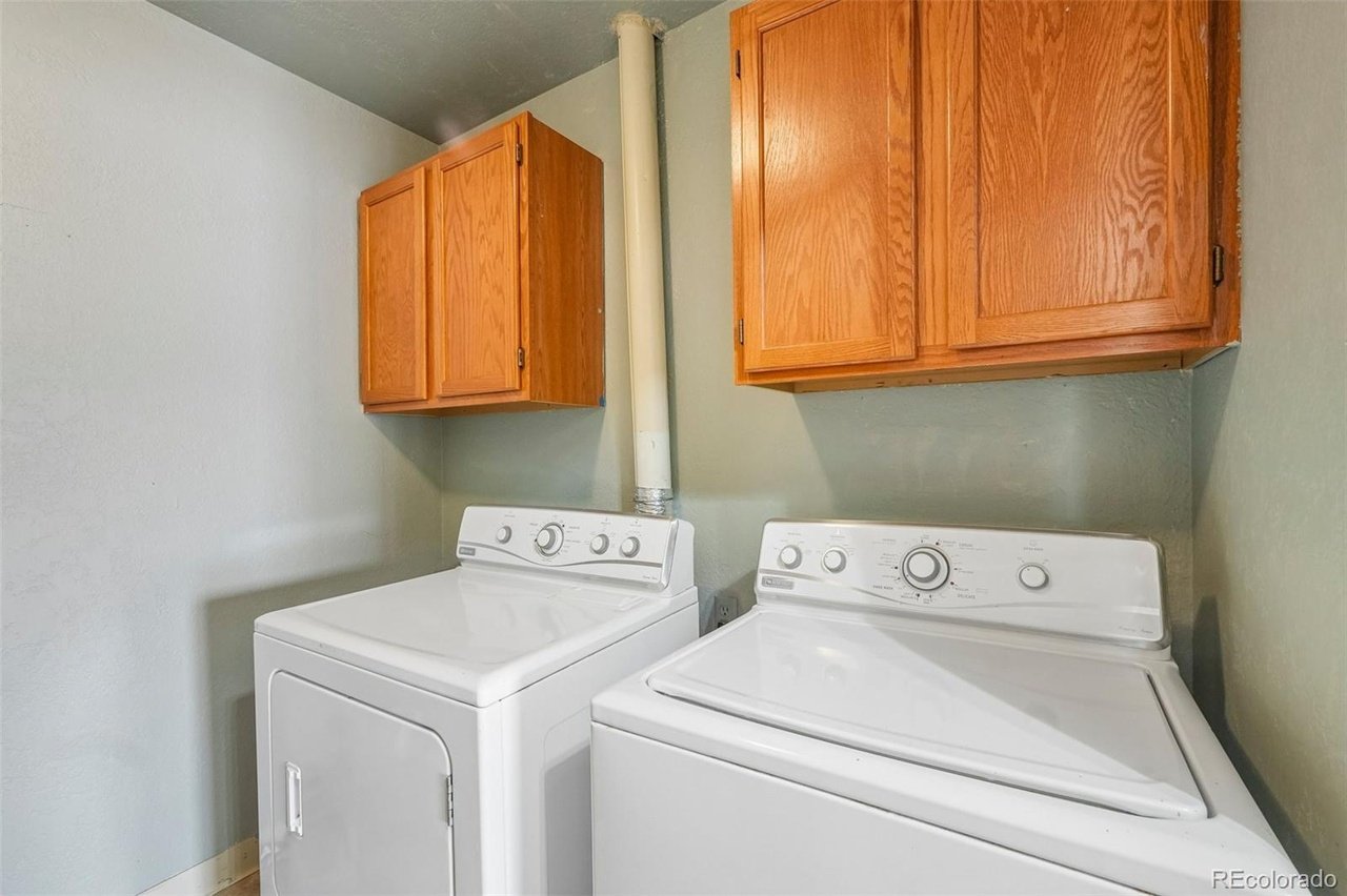 Lake Woodmoor Investor Special – Rare 1-Bed Lakeside Townhome with Huge Upside
